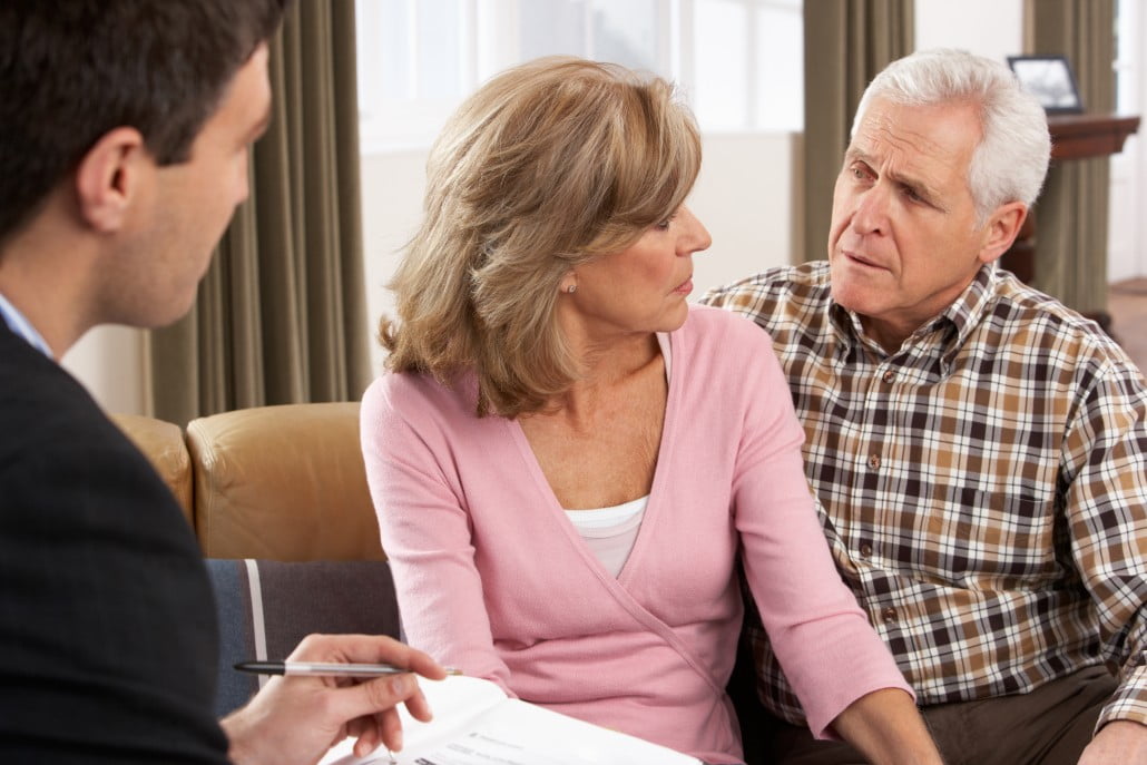 Senior Couple Talking With Financial Advisor
